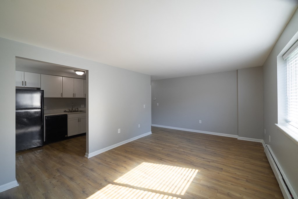 Renovated Living Room window view  at Willowbrooke Apartments & Townhomes at 396 Willowbrooke Drive in Brockport, NY 14420