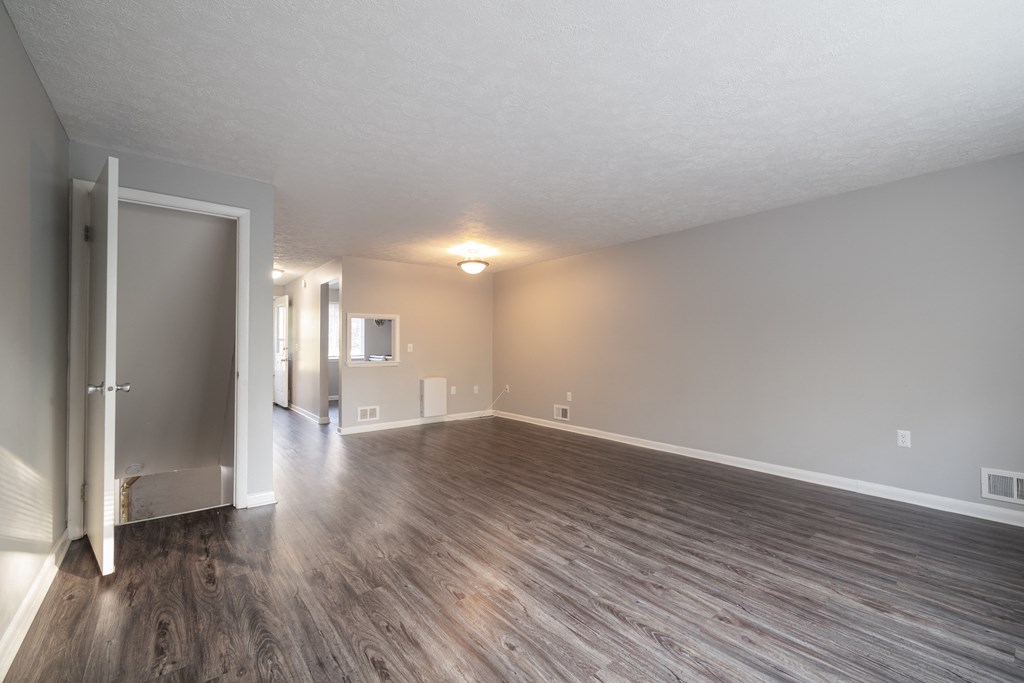 Renovated Living Room at Willowbrooke Apartments & Townhomes at 396 Willowbrooke Drive in Brockport, NY 14420
