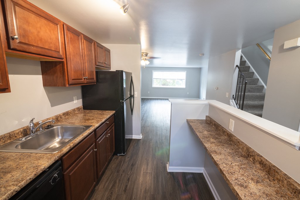 Updated Kitchen with cabinets at Willowbrooke Apartments & Townhomes at 396 Willowbrooke Drive in Brockport, NY 14420