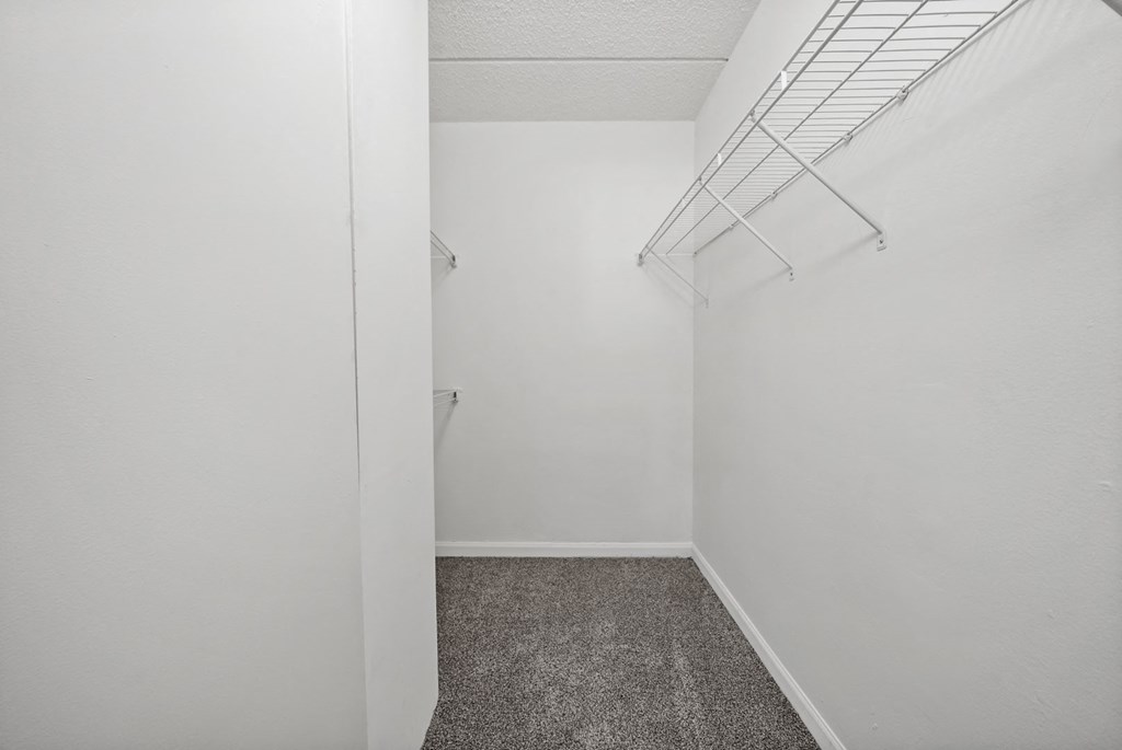 Renovated Bedroom Closet space at Woodland Ridge Apartments in Woodridge, IL