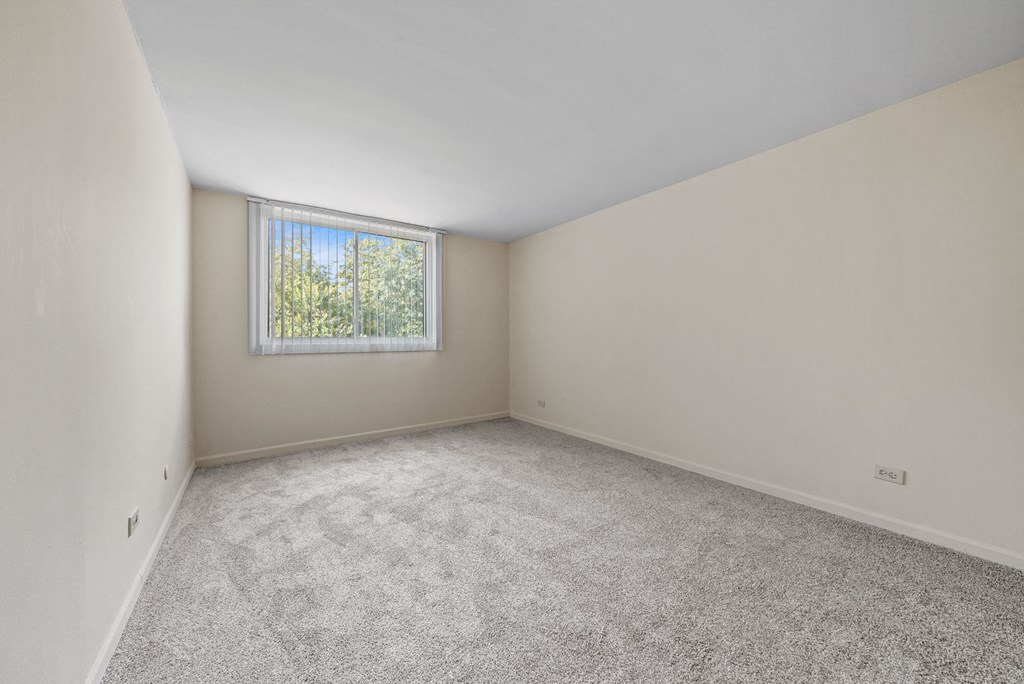 Home Bedroom area at Woodland Ridge Apartments in Woodridge, IL