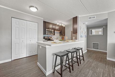 Renovated Kitchen with white interior at Woodland Ridge Apartments in Woodridge, IL