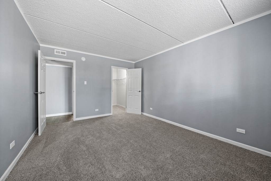 Renovated Bedroom with bathroom at Woodland Ridge Apartments in Woodridge, IL