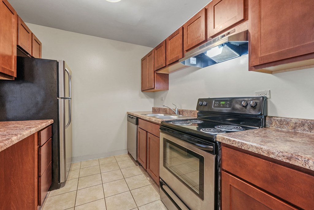 Upgraded Kitchen with wooden floor at Woodland Ridge Apartments in Woodridge, IL