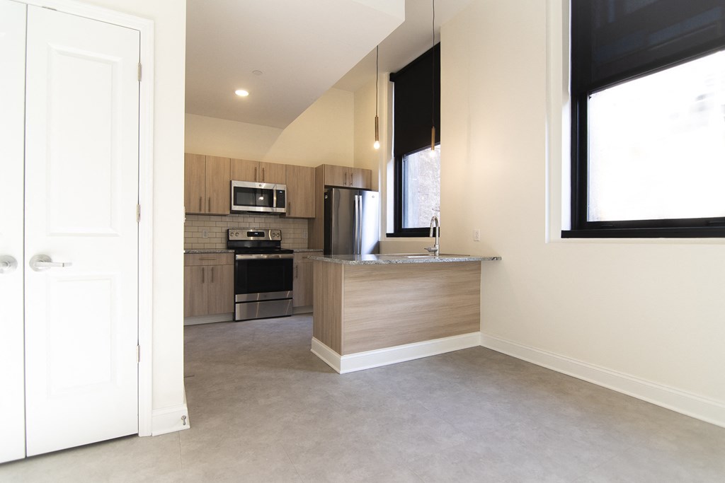 a view of a kitchen with a counter top and