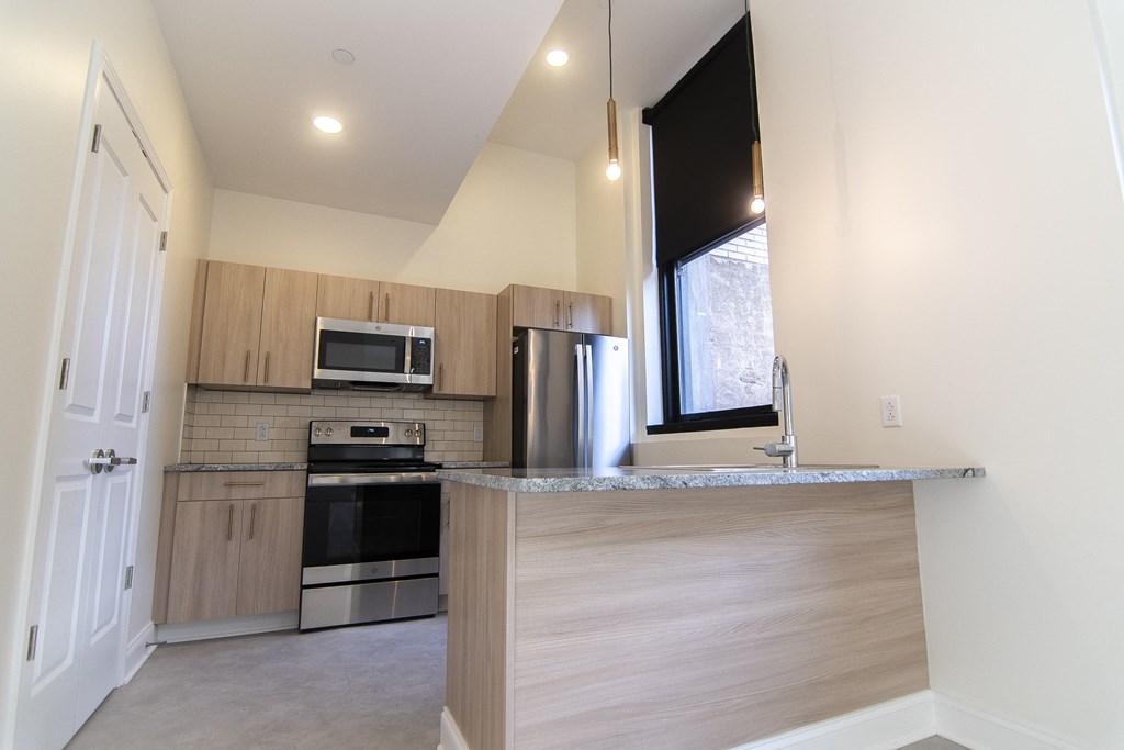 a kitchen with a counter top and a