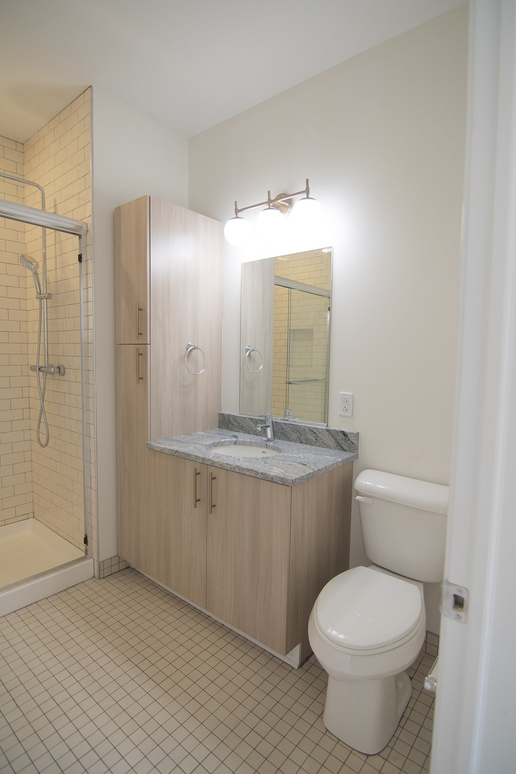 a small bathroom with a toilet and a shower