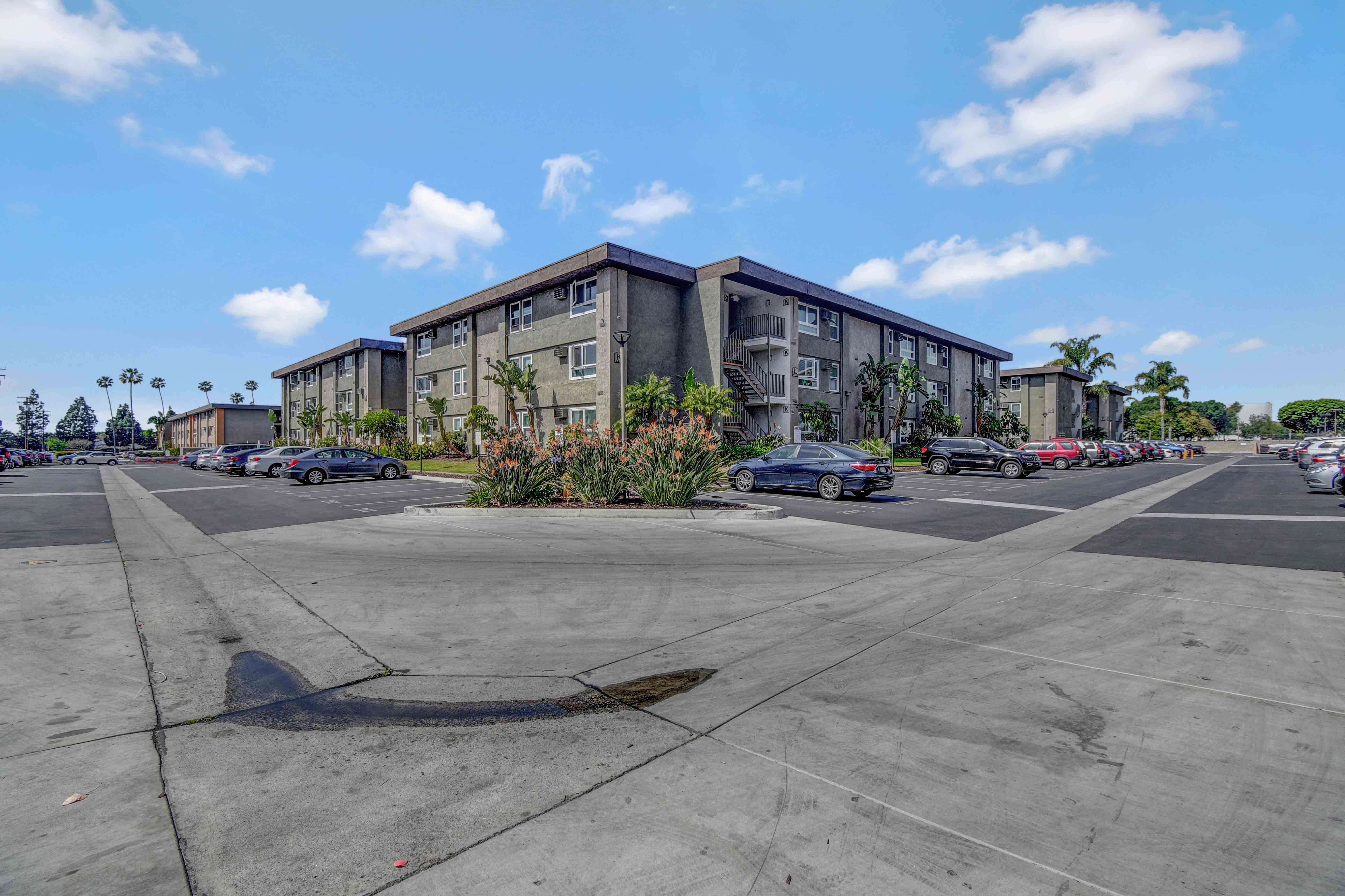 Back corner of the community with the K building and the parking area in view in both directions