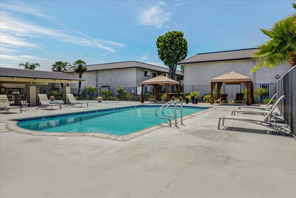 Pool Views with Cabanas and Furniture