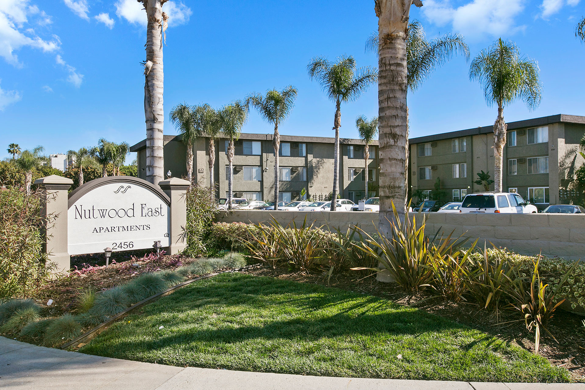 Street View of Nutwood East with monument sign and A building in the background