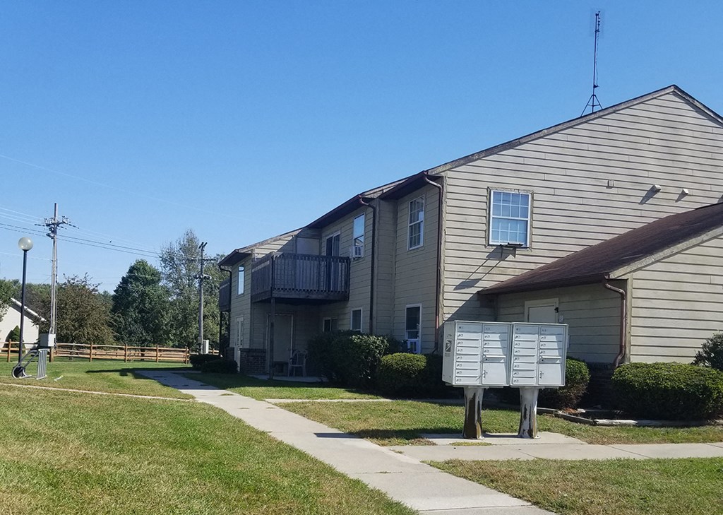 a house with a sign in front of it