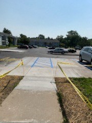 a parking lot with cars parked in it