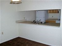 a kitchen with a counter top and a sink