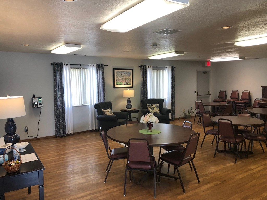 a large room with tables and chairs