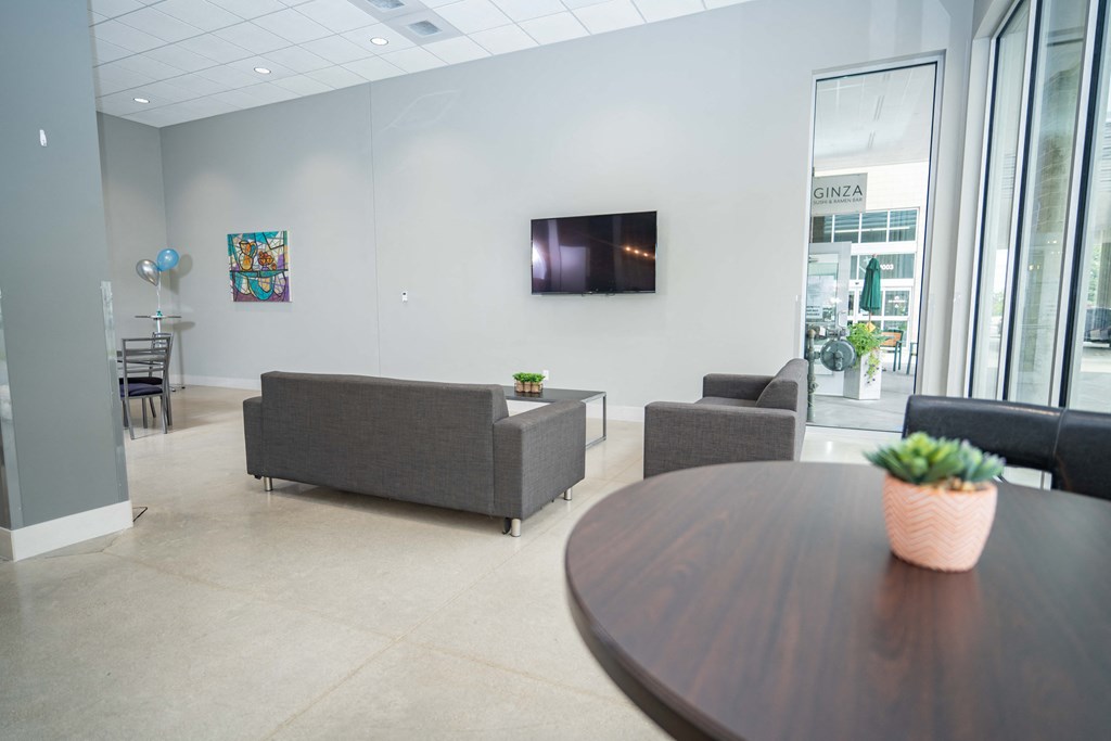 a room with couches and a table