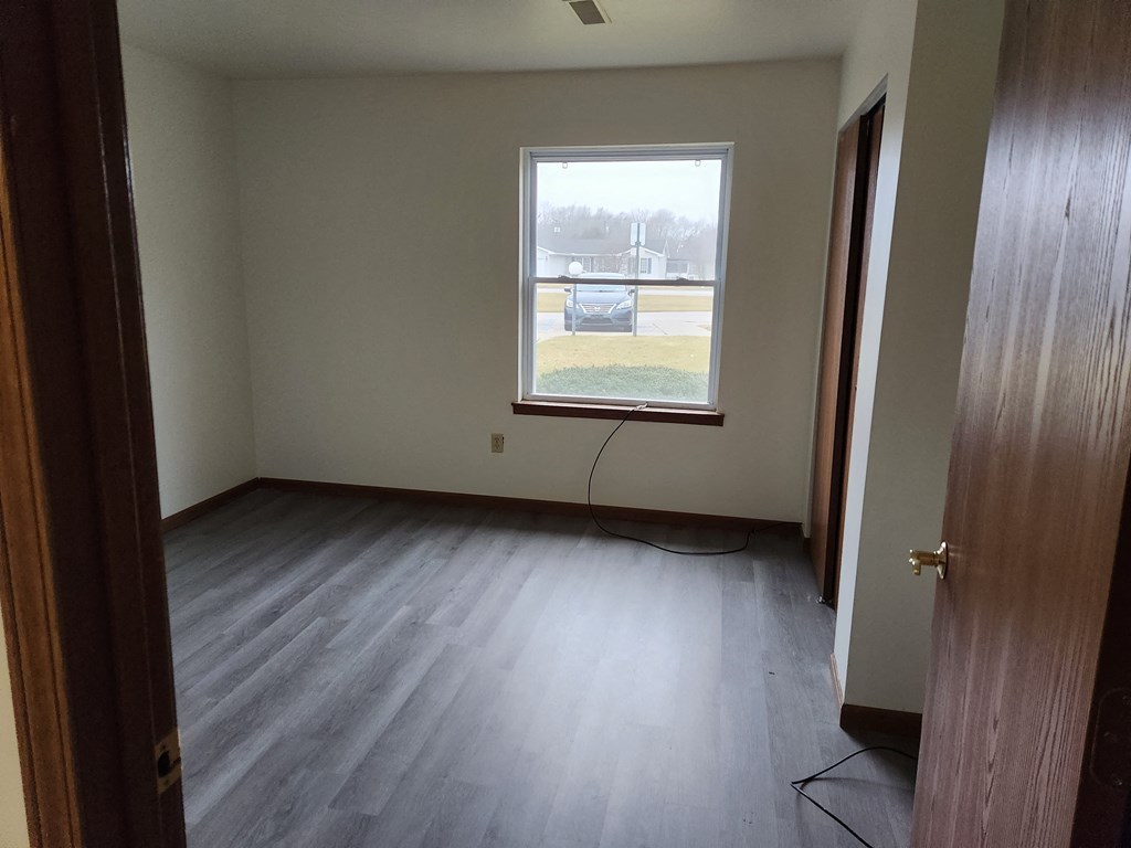 room in a large house with garden and fireplace