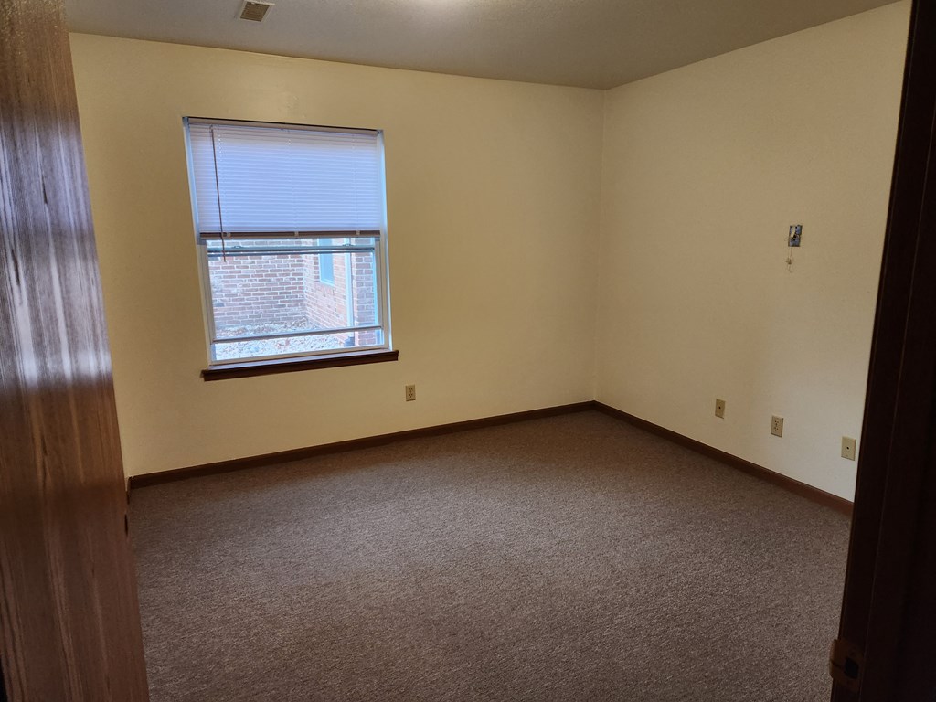 an empty room with a window