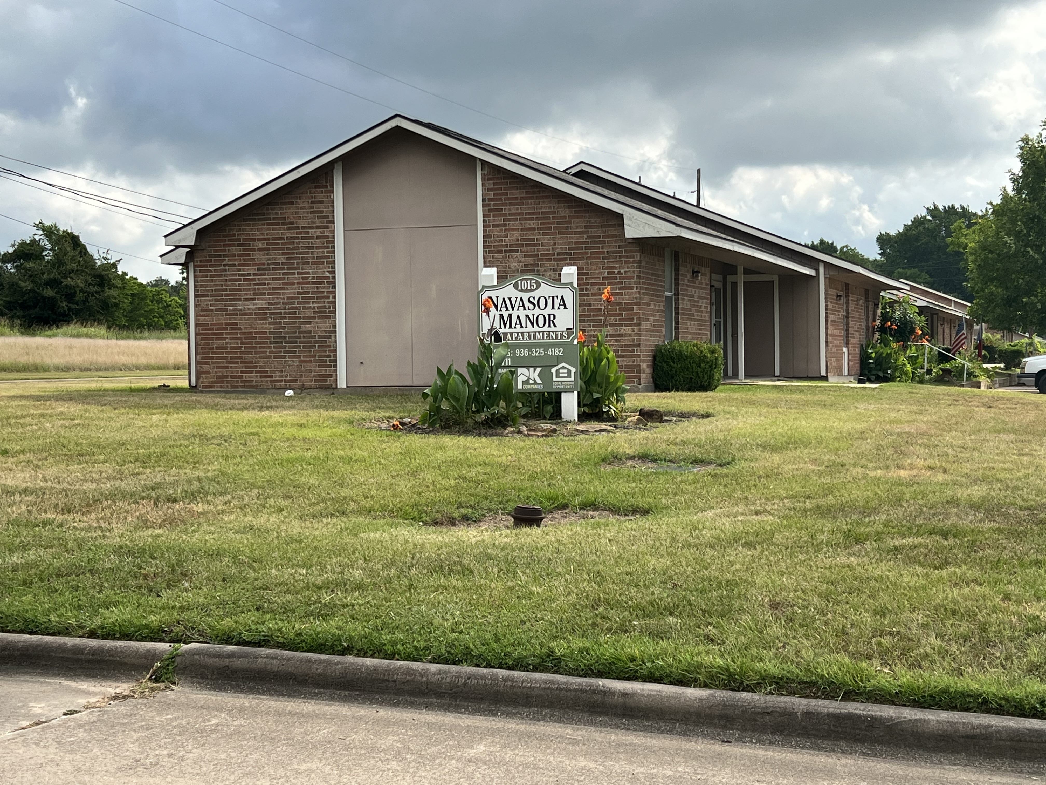 a house with a sign in front of it