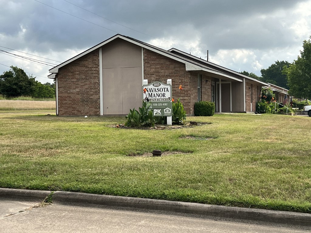 a house with a sign in front of it