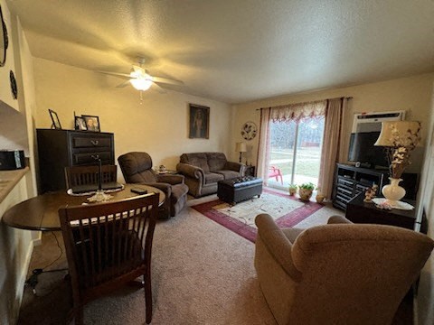 a living room filled with furniture and a flat screen tv