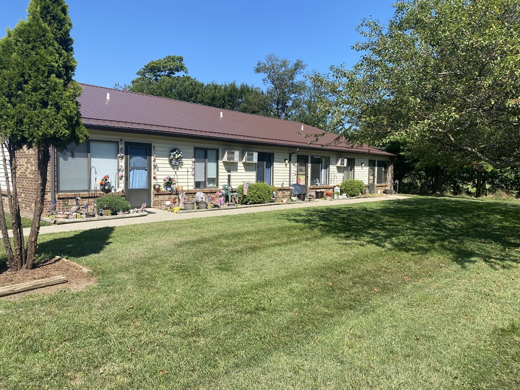 a house with a yard in front of it