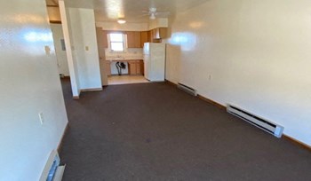 Orland Manor Apartments living room facing kitchen Orland Manor Apartments living room facing kitchen Indiana - Photo Gallery 3