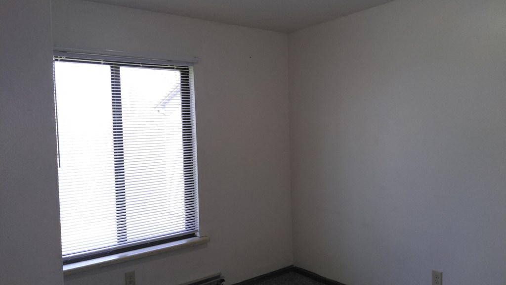 Mill Pond Family Apartments bedroom, Brooklyn, MI