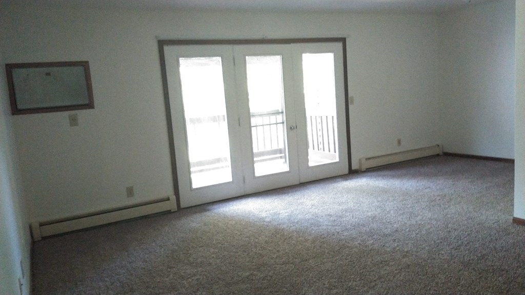 Mill Pond Family Apartments living room, Brooklyn, MI