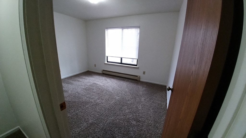 an empty room with a window