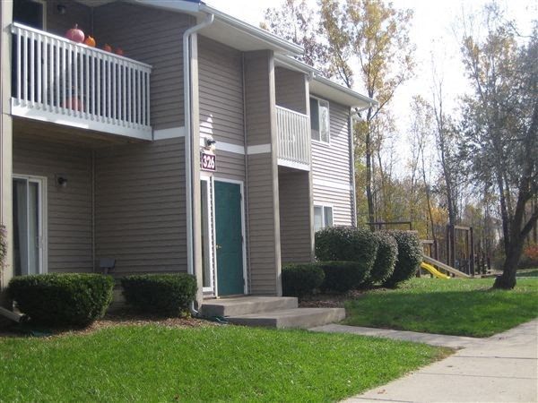 a house with a porch on the side of it