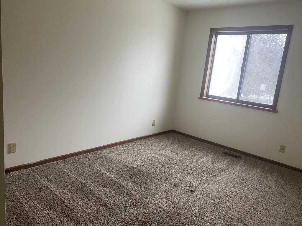 an empty room with a window