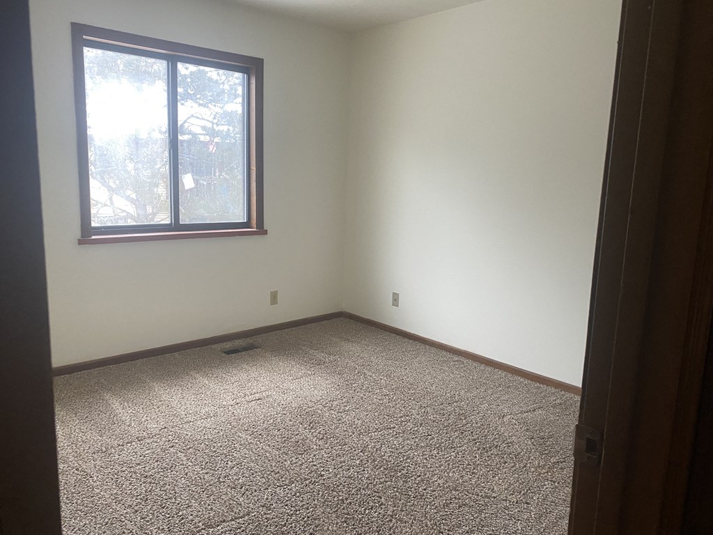 an empty room with a window