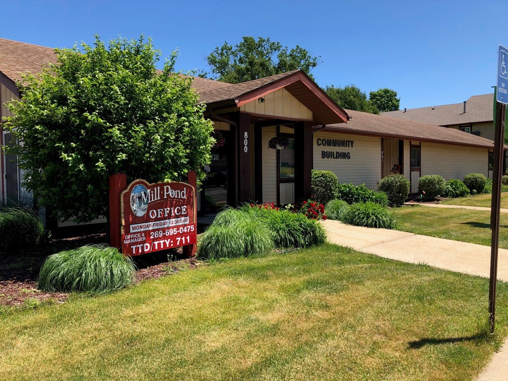 a building with a sign in front of it