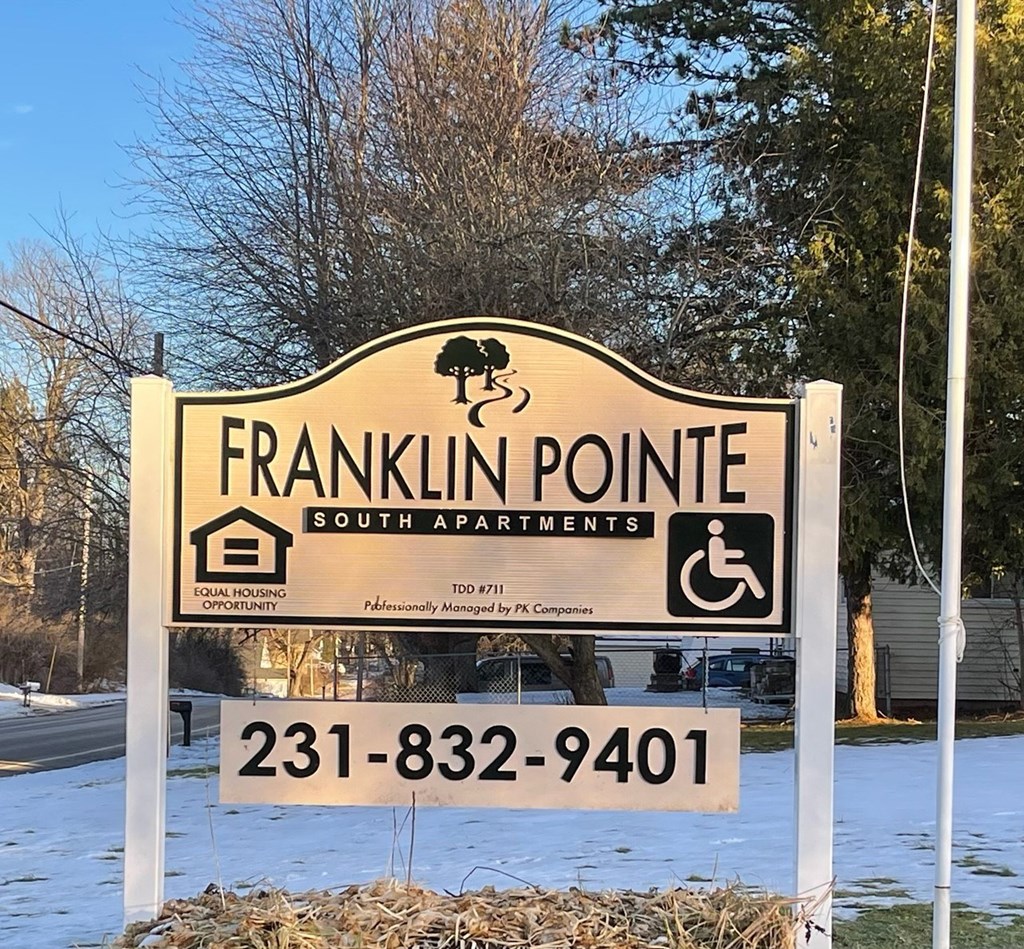 a sign that reads apartments