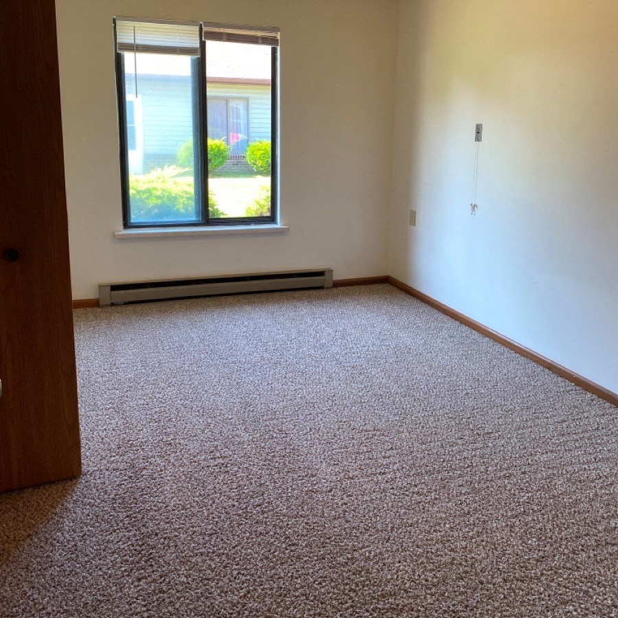 an empty room with a window