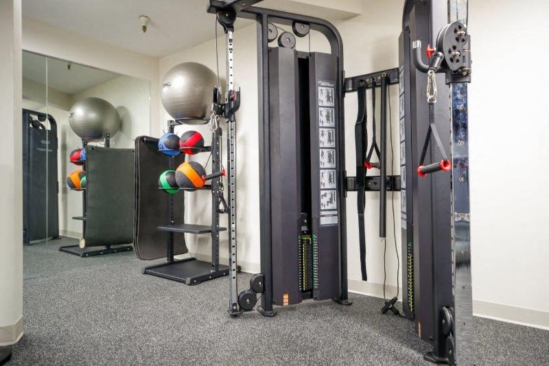 a home gym with weights and other equipment