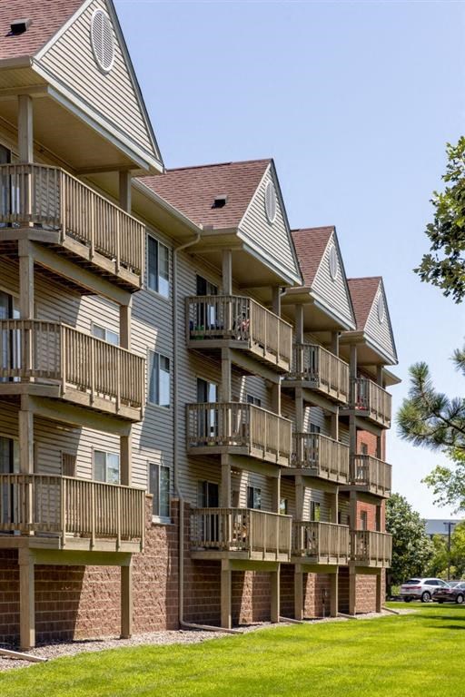 the balconies of an apartment building on a sunny day