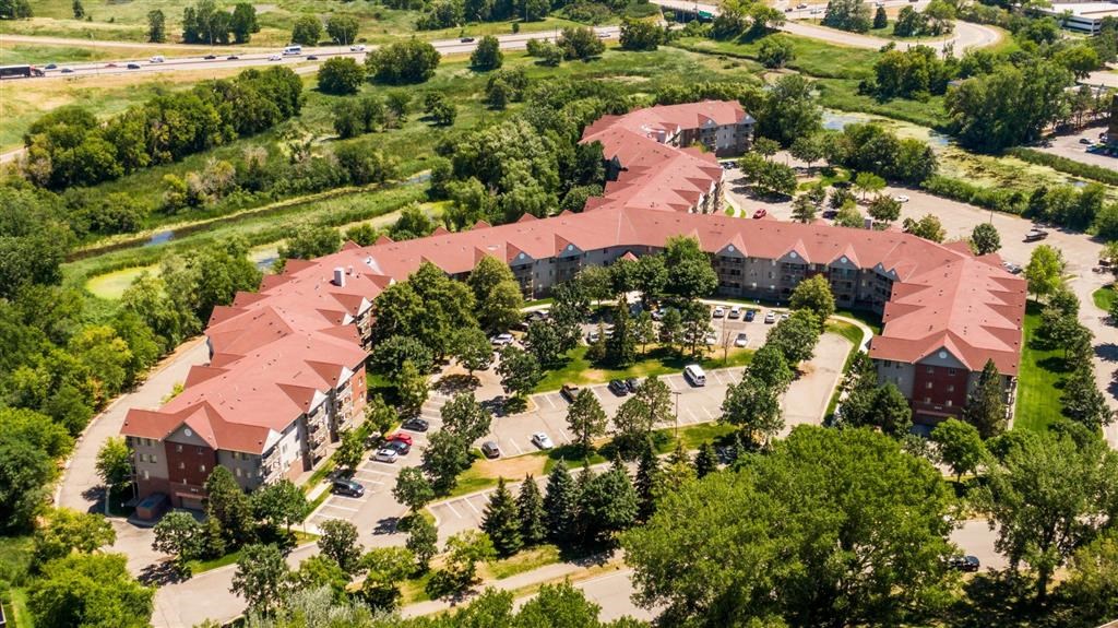 an aerial view of a campus with buildings and trees