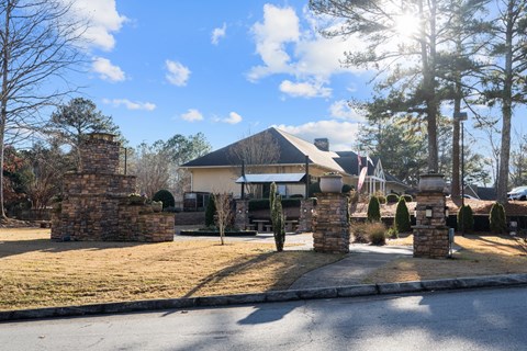 A house with a flag on the front porch.