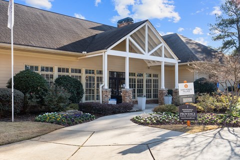 A building with a sign that says "Providence" in front of it.