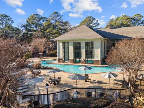 A house with a pool in the backyard.