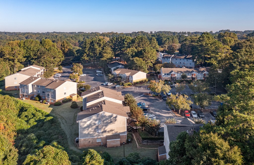 a aerial view of a neighborhood with houses and trees