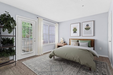 a bedroom with a bed and two windows