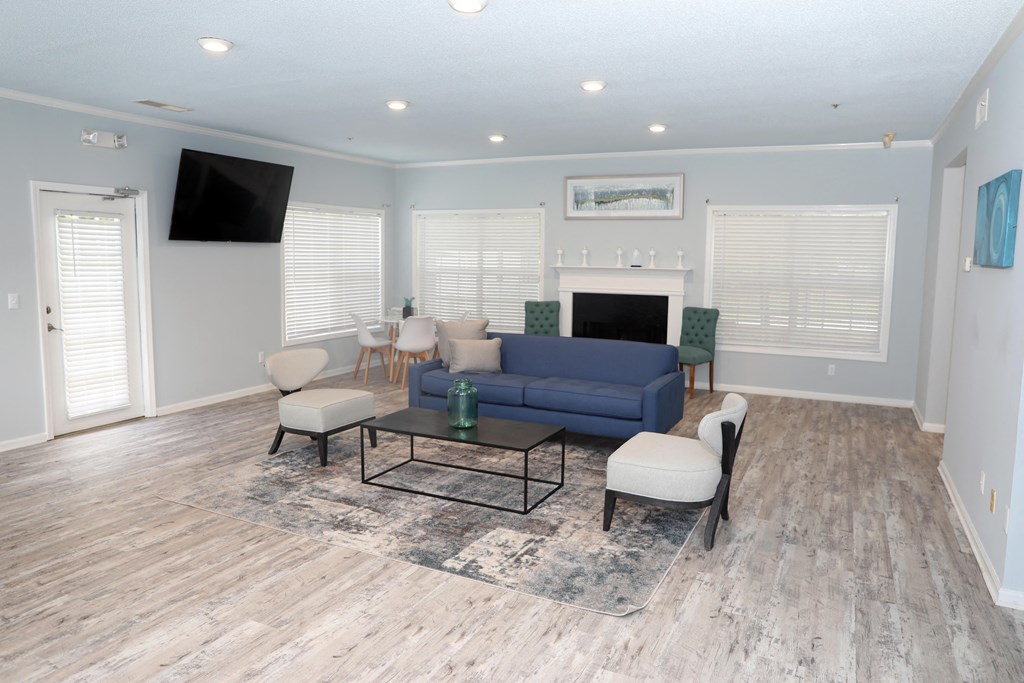 a living room with a couch and a table