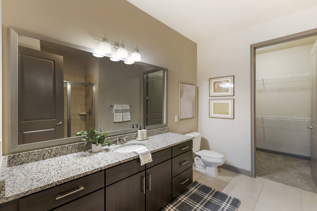 a bathroom with a large mirror