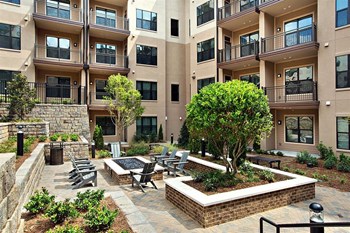 Outdoor courtyard with fire pit Outdoor courtyard with fire pit at Radius West Midtown, Atlanta, GA - Photo Gallery 2