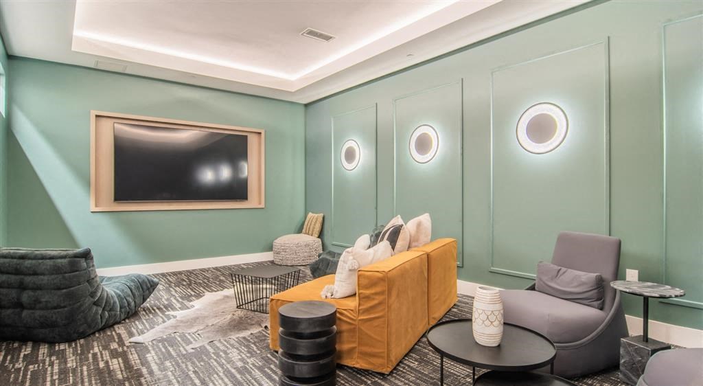 a living room with a couch and a television