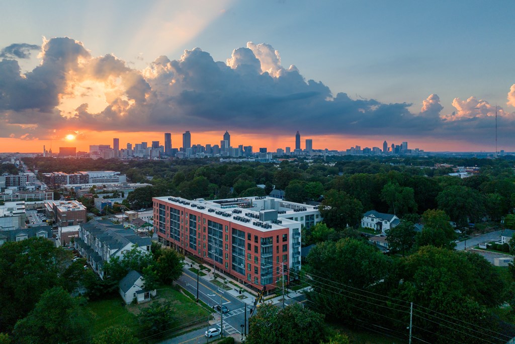 an aerial view of philadelphia at sunset with the philadelphia skyline in the background