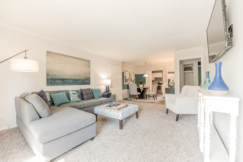 a living room with a couch and a coffee table