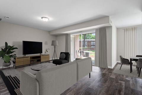 a living room with a couch and a tv